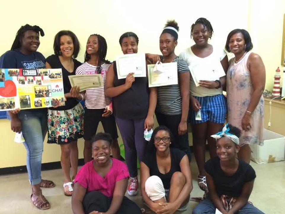 Girls showing their certificates